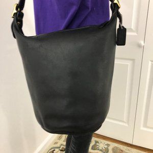 Early Vintage Coach black leather large Duffle bag Style -9085 .